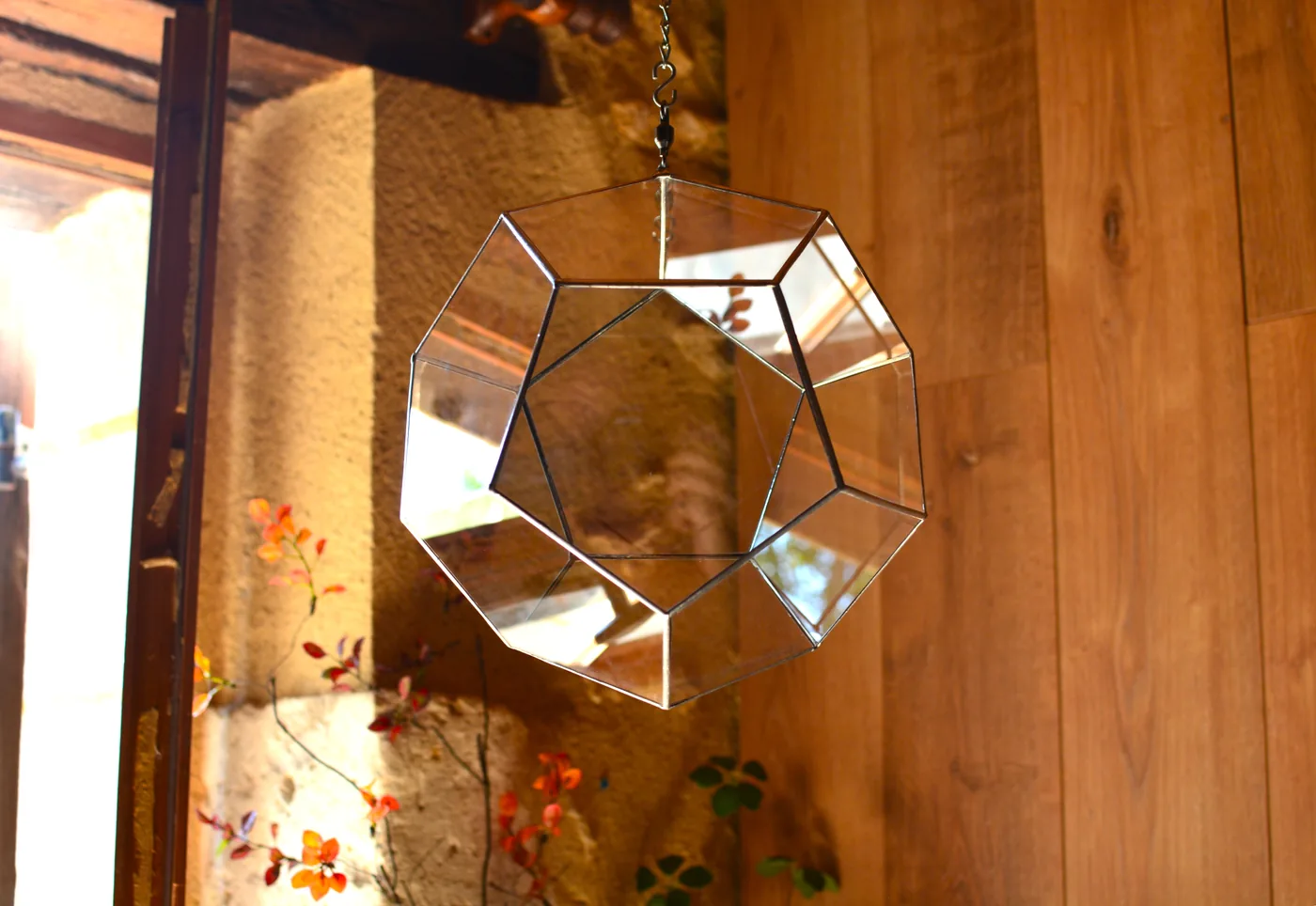 Dodecahedron hanging in front of the workshop window