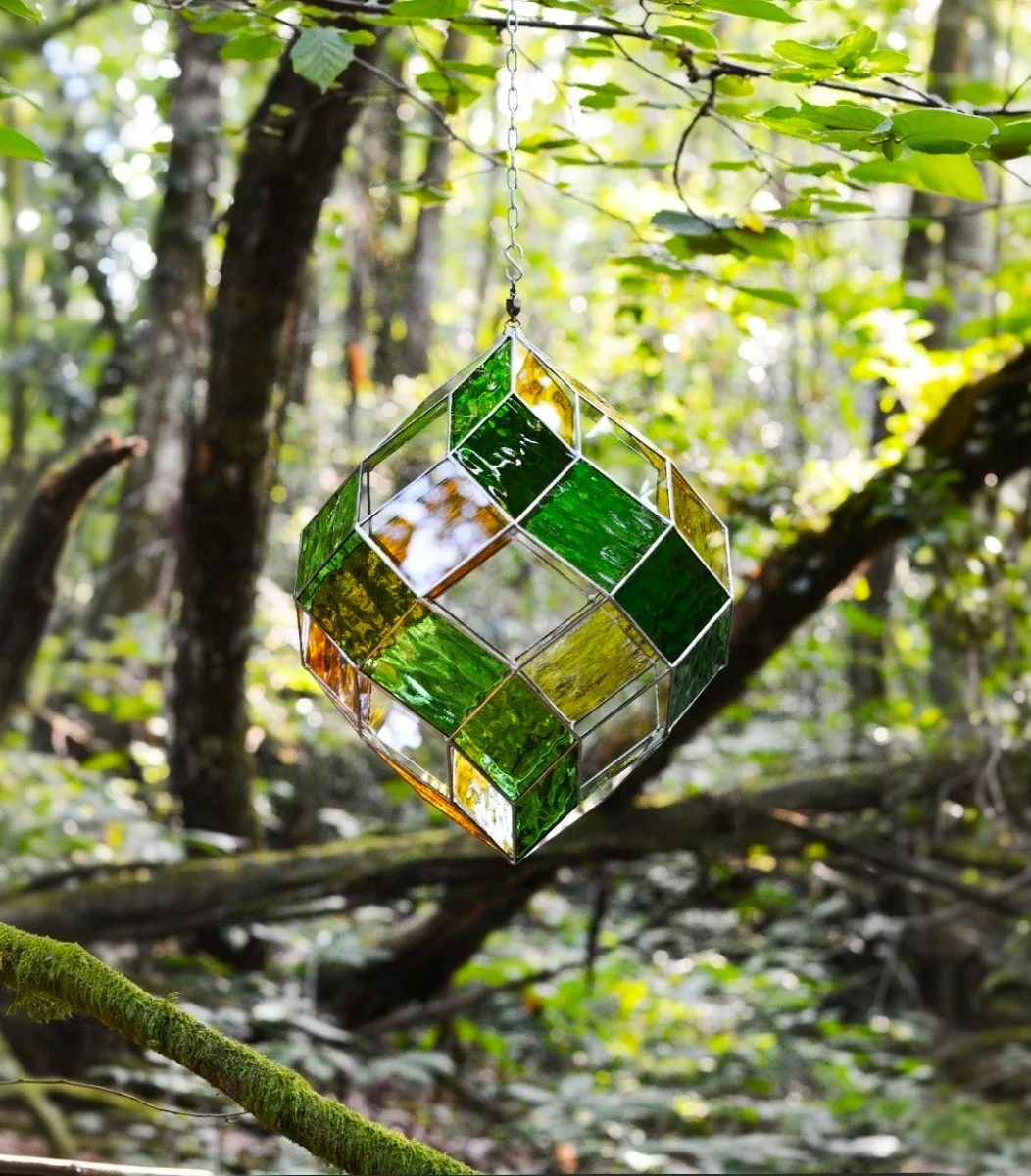 Pi Zome 8 Âme de la forêt suspendu dans les bois